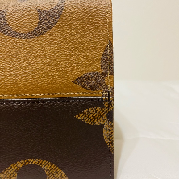 Authentic Louis Vuitton On The Go GM Tote in Reverse Monogram Canvas - Picture 7 of 16